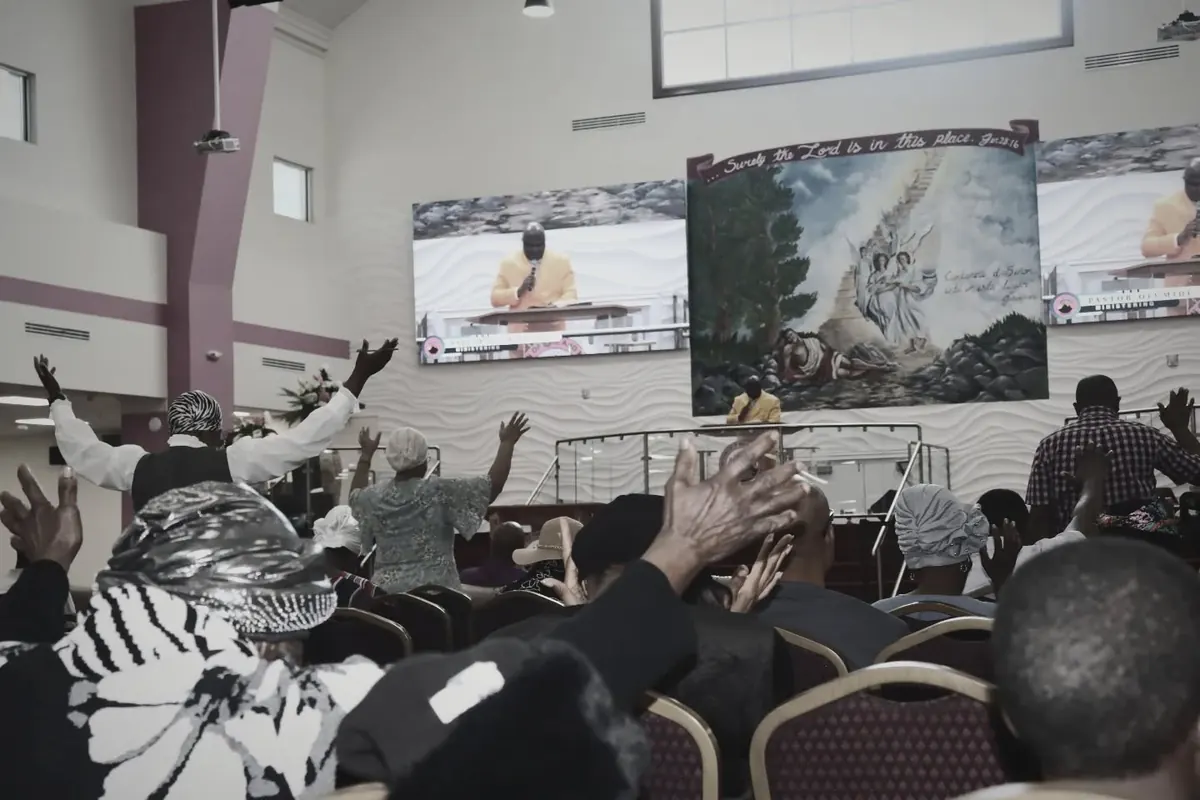 Hands raised in prayer